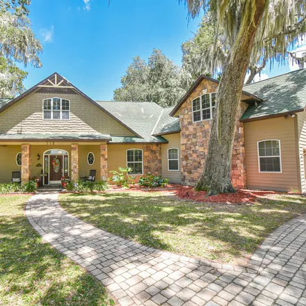 Buy this 4 bed house on 100 Beecher's Point Drive in Putnam County, FL 32193