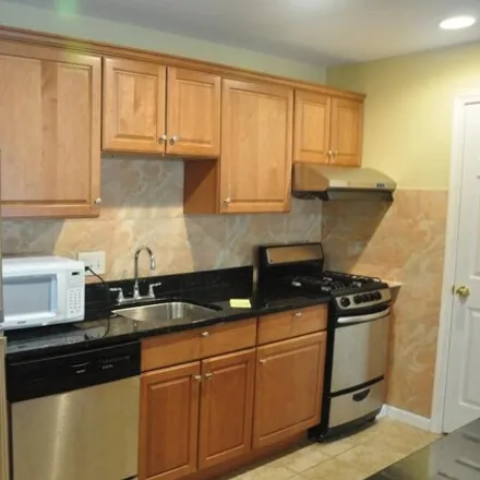 Rent this 2 bed apartment on 3024 Kings Chapel Road in Merrifield, VA 22042