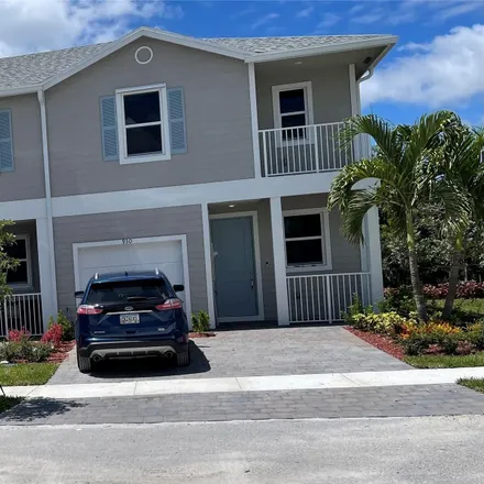 Buy this 3 bed townhouse on 1856 Southeast 19th Street in Homestead, FL 33035