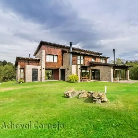 Rent this 3 bed house on Arelauquen Golf Club in Las Frambuesas, Villa Lago Gutiérrez