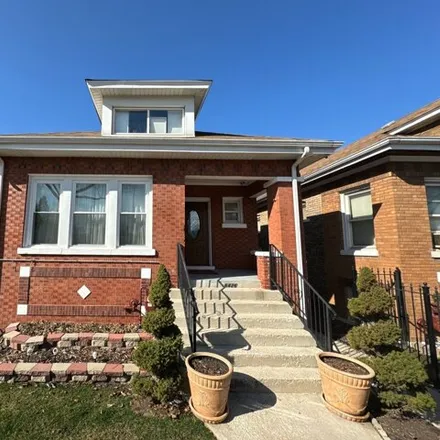 Buy this 4 bed house on 6426 South Washtenaw Avenue in Chicago, IL 60629