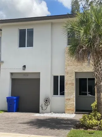 Buy this 4 bed townhouse on 258 Pioneer Way in Royal Palm Beach, Palm Beach County