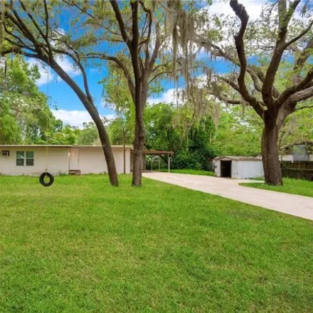 Buy this 3 bed house on 38369 Palm Grove Drive in Pasco County, FL 33542
