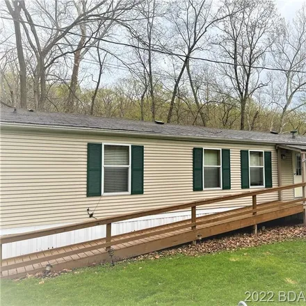 Buy this 2 bed house on 99 Lake Road F-8 in Camden County, MO 65079