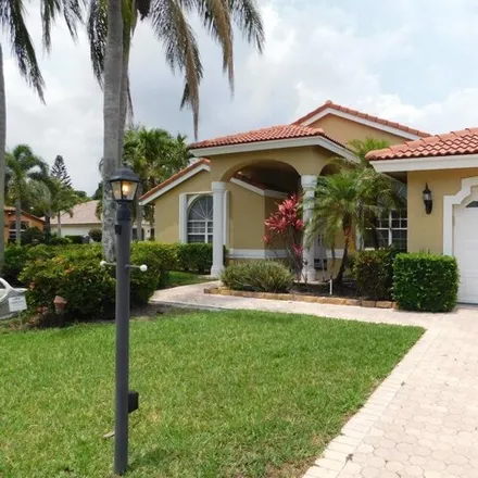 Rent this 2 bed house on 5661 Aspen Ridge Circle in High Point, Palm Beach County