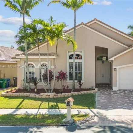 Buy this 4 bed house on 2597 Northwest 124th Avenue in Coral Springs, FL 33065