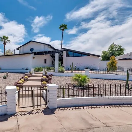 Buy this 4 bed house on 1401 W Ocotillo Rd in Phoenix, Arizona