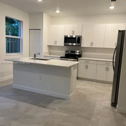Rent this 3 bed apartment on Southeast 27th Terrace in Homestead, FL 33035
