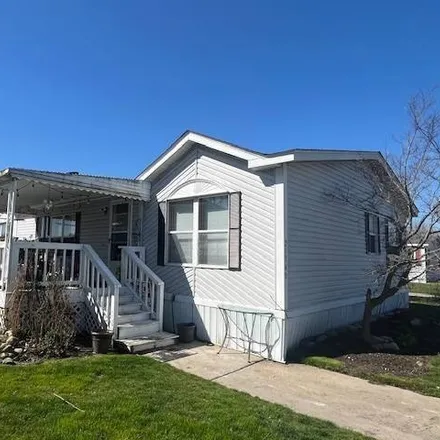 Buy this studio apartment on 46497 Gabriell Drive in Macomb Township, MI 48044