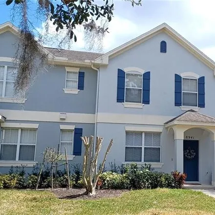 Buy this 3 bed townhouse on 8879 Newmarket Drive in Lakeside Village, FL 34786