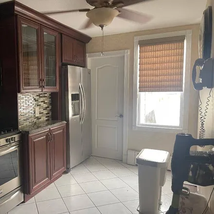 Rent this 2 bed house on 75-06 66th Drive in New York, NY 11379
