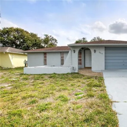 Buy this 3 bed house on 7412 San Carlos Drive in Jasmine Estates, FL 34668