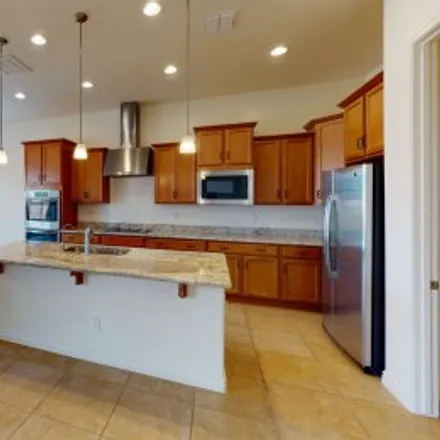 Rent this 4 bed apartment on 2770 East Indian Wells Drive in Mountainwood, Gilbert