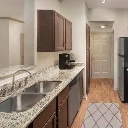 Rent this 2 bed apartment on N Milam St