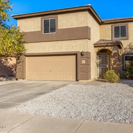 Buy this 4 bed house on 25230 West Parkside Lane South in Buckeye, AZ 85326