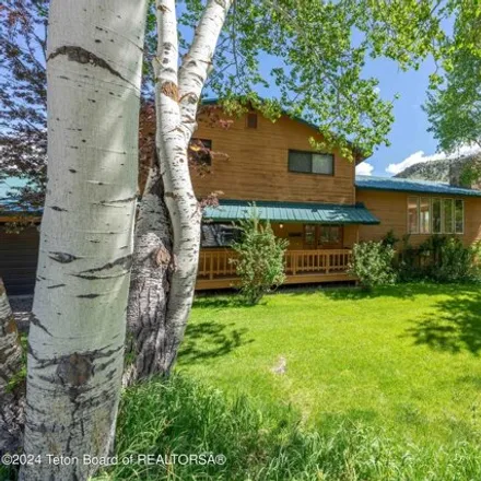 Buy this 4 bed house on 840 Upper Cache Creek Dr in Jackson, Wyoming