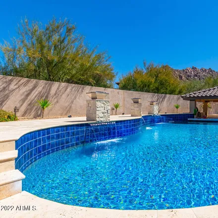 Buy this 5 bed house on 26475 North 106th Way in Scottsdale, AZ 85255
