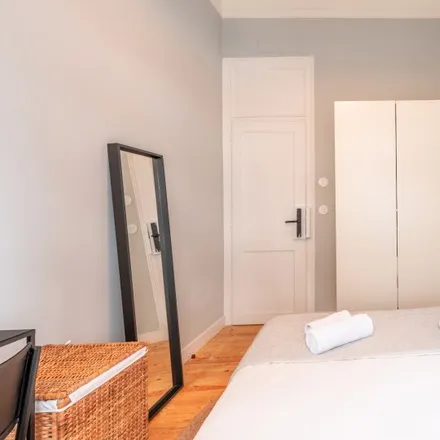 Rent this 19 bed room on Rua Doutor Álvaro de Castro in 1600-021 Lisbon, Portugal