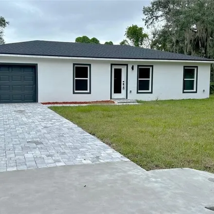 Rent this 3 bed house on 80 Hemlock Trail in Marion County, FL 34472