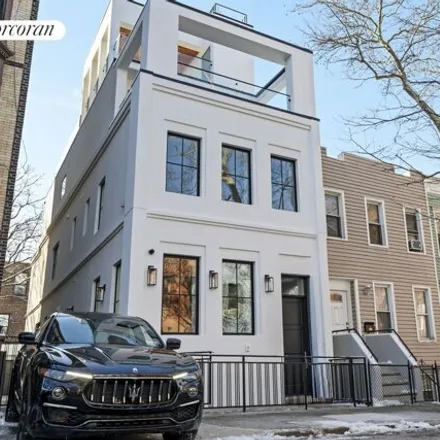 Buy this 5 bed townhouse on 232 8th Street in New York, NY 11215