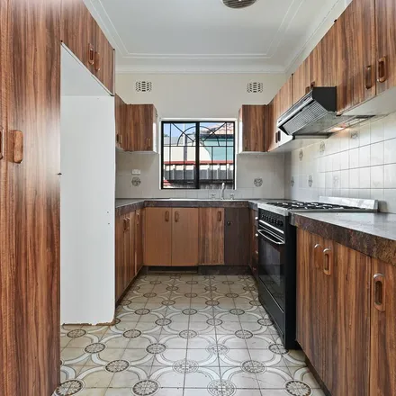 Rent this 4 bed apartment on Karingal Street in Kingsgrove NSW 2208, Australia