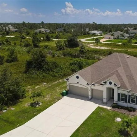 Buy this 4 bed house on 8626 Agate St in Port Charlotte, Florida