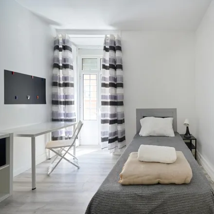 Rent this 7 bed room on Rua Carvalho Araújo 75 in 1900-140 Lisbon, Portugal