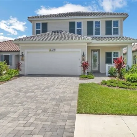Rent this 4 bed house on Centaurus Circle in Collier County, FL