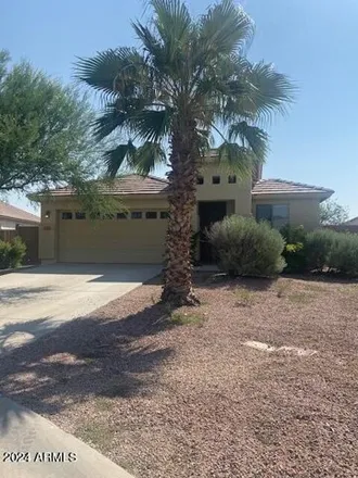 Rent this 4 bed house on 35497 North Shorthorn Trail in San Tan Valley, AZ 85143