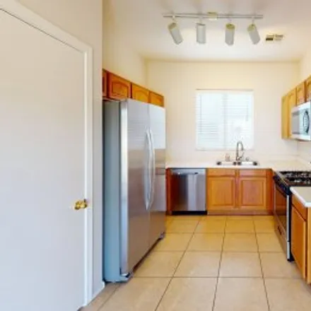 Rent this 3 bed apartment on 614 East Colt Court in San Vincente, Chandler