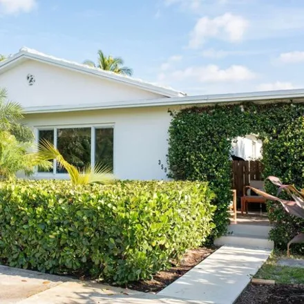 Rent this 3 bed house on 361 Ellamar Road in West Palm Beach, FL 33405