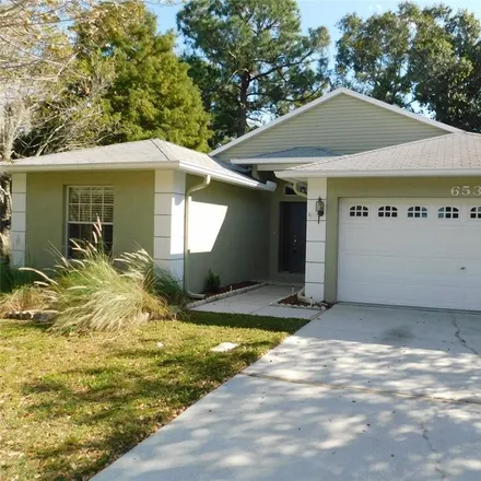Rent this 3 bed house on 7153 Daffodil Drive in Brooksville, Hernando County