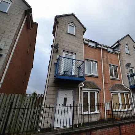 Rent this 4 bed townhouse on 31 Dearden Street in Manchester, M15 5LZ