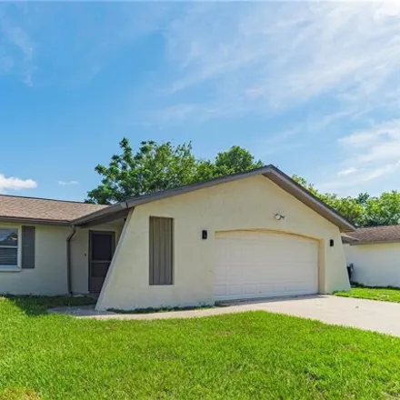 Rent this 2 bed house on 7107 Moravian Drive in Jasmine Estates, FL 34668