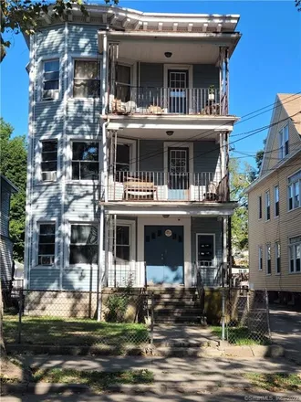 Buy this 6 bed townhouse on 81;83 Truman Street in New Haven, CT 06519