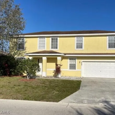 Rent this 4 bed house on 117 Shadow Lakes Drive in Lehigh Acres, FL 33974