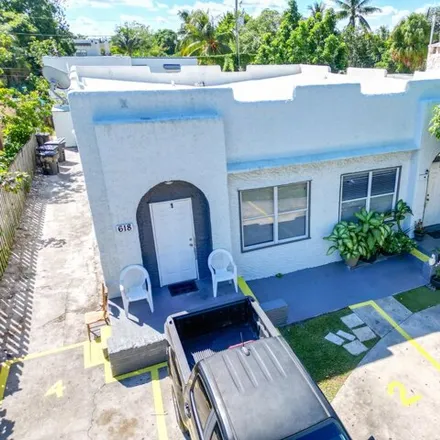 Buy this 7 bed house on 646 32nd Street in West Palm Beach, FL 33407