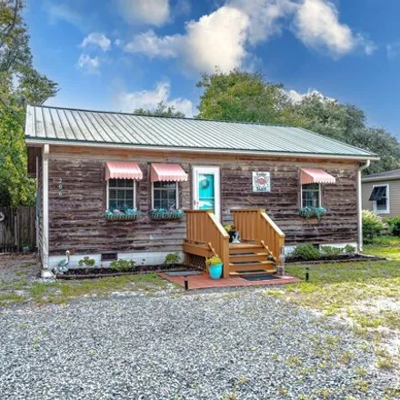 Buy this 3 bed house on 208 Northeast 67th Street in Oak Island, Brunswick County
