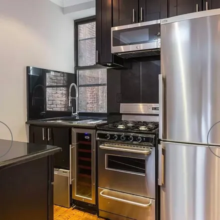 Rent this 3 bed apartment on 462 West 51st Street in New York, NY 10019