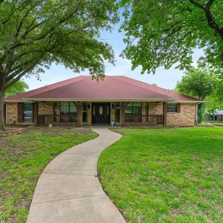 Rent this 4 bed house on 922 Beverly Court in Lewisville, TX 75067