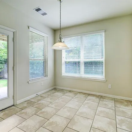 Rent this 4 bed apartment on 63 Sawbridge Circle in The Woodlands, TX 77389