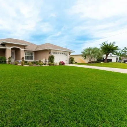 Buy this 3 bed house on 1046 17th Place Southwest in Florida Ridge, FL 32962