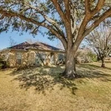 Rent this 4 bed house on 1505 Northridge Drive in Carrollton, TX 75006