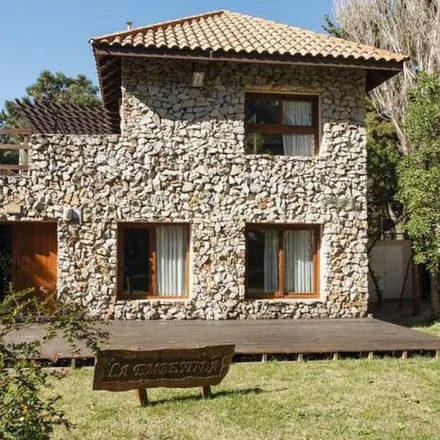 Buy this 4 bed house on Las Toninas in Partido de Villa Gesell, 7165 Mar de las Pampas