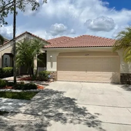 Rent this 4 bed house on 1277 Chenille Circle in Weston, FL 33327