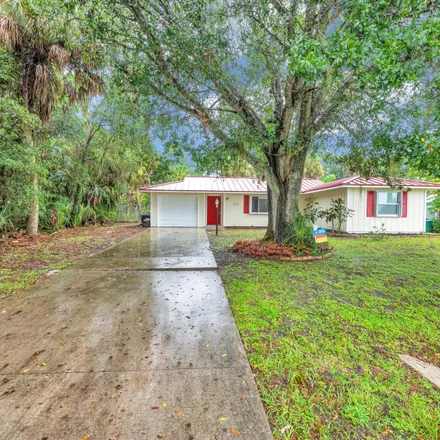 Rent this 3 bed house on 7092 Eden Road in Lakewood Park, FL 34951