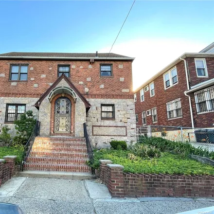 Buy this 5 bed townhouse on 43-03 76th Street in New York, NY 11373