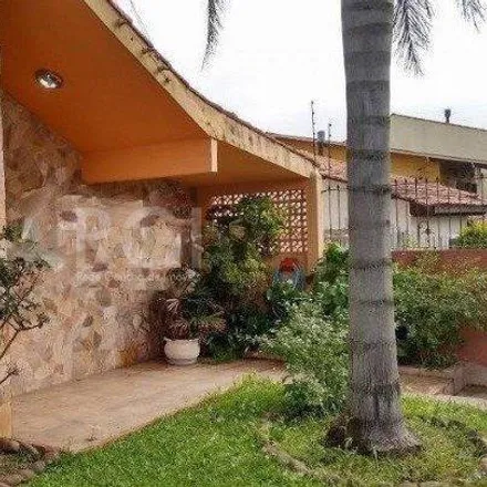 Buy this 3 bed house on Floricultura Winge in Rua Doutor Mário Totta 963, Tristeza