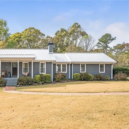 Buy this 4 bed house on 13470 Cogburn Road in Milton, GA 30004