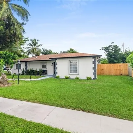 Buy this 4 bed house on 802 Southeast 16th Court in Deerfield Beach, FL 33441